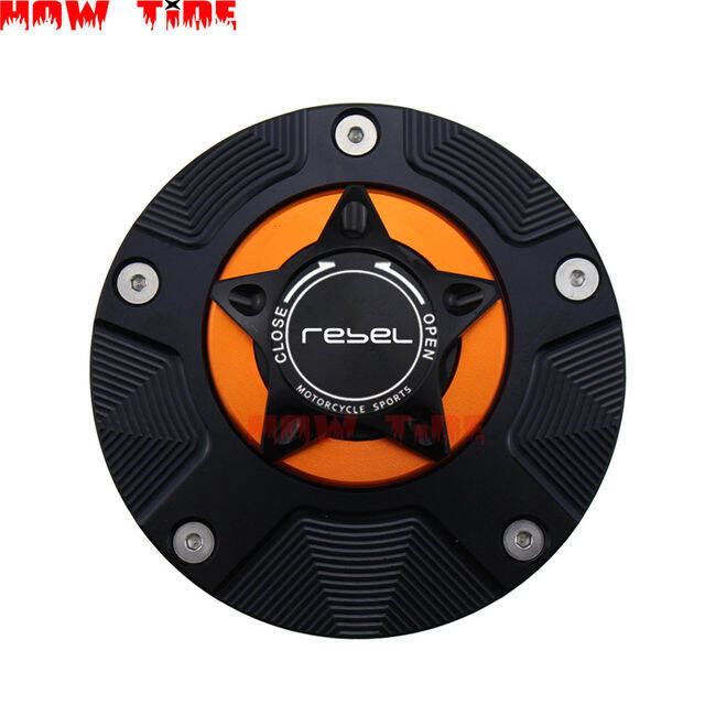 thumbnail interactive-video image 1 of TCMT Chrome Gas Tank Cap For Honda Rebel 250 VF700C VF750C CMX250C VT1000C - Iron 1 of 2