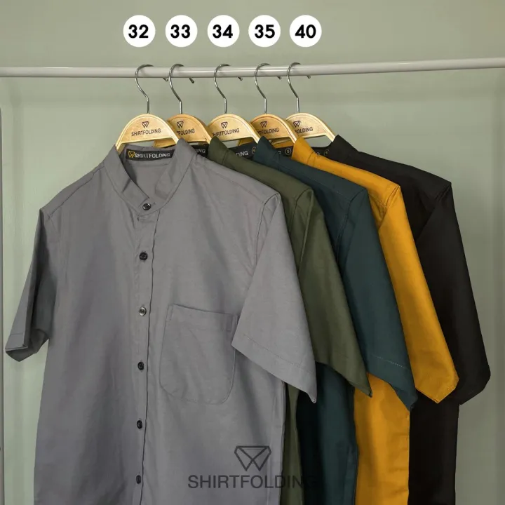 shirtfolding-เสื้อเชิ้ต-แขนสั้นคอจีน-กระดุมดำ-สีเทาดิน-สีเขียวขี้ม้า-สีเขียวเข้ม-สีเหลืองมัสตาส-สีดำ