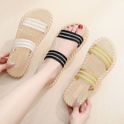 Summer travel outside wear imitation straw ribbon female sandals fashion a word procrastinates beach thick bottom flat with the new female slippers