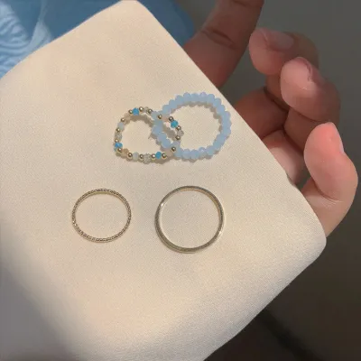 ZhongLouL แหวนลูกปัดคริสตัลหลากสี,ชุดแหวนลูกปัดคริสตัลเรียบง่ายสวยงามปรับได้โซ่เชือกแหวนใส่นิ้วเครื่องประดับชุดแหวนแหวนแบบซ้อนหลายอัน S สำหรับวัยรุ่นหญิงผู้หญิง4ชิ้น