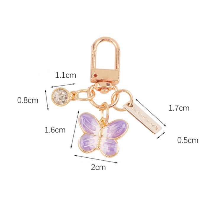 พวงกุญแจรูปการ์ตูนพวงกุญแจตัวอักษรจี้รูปพวงกุญแจผีเสื้อผีเสื้อจี้ไข่มุกตัวอักษรโลหะผสมจี้พวงกุญแจน่ารัก