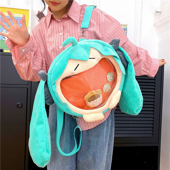 น่ารักอะนิเมะกระเป๋าเป้สะพายหลังสำหรับผู้หญิงสาวการ์ตูน-miku-คอสเพลย์กระเป๋านักเรียนนักศึกษาสีเขียวตุ๊กตากระเป๋าสะพายเด็กของขวัญวันเกิด