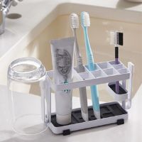 ที่ใส่ถ้วยยาสีฟันแปรงสีฟันที่เก็บอุปกรณ์อาบน้ำในห้องน้ำชั้นแขวนแปรงสีฟัน