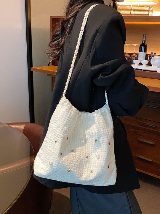 กระเป๋าผู้หญิงความจุสูง-2023-ใหม่นี้เป็นที่นิยมในฤดูร้อนนี้กระเป๋าสะพายโซ่ที่เข้ากันได้ทั้งหมดกระเป๋าผ้ากระเป๋าถังเนื้อ