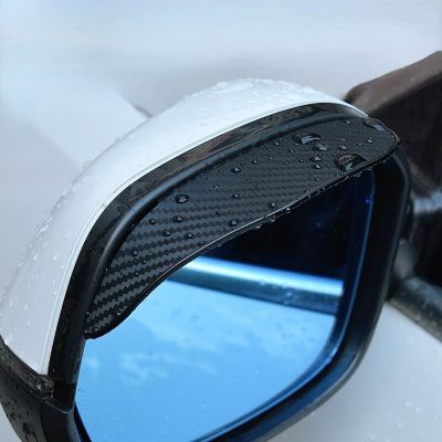ที่ป้องกันกระจกมองหลังรถยนต์ที่บังฝนสีดำใสใช้ได้ทั่วไป2ชิ้น/คู่ที่บังฝนคิ้วกระจกมองหลังรถยนต์