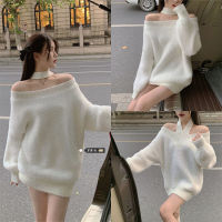 Off-shoulder knitted sweater. Lengthened top