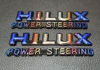 1คู่ HILUX POWER STEERING สีไทเทเนียมเงิน  โลโก้ไฮลักษ เพาว์เวอร์สเตียริงค์ ติดข้างแก้ม โตโยต้าไมตี้ ไมตี้-X พลัส TOYOTA HILUX MIGHTY-X LN 85-111 SR-5 1989-199