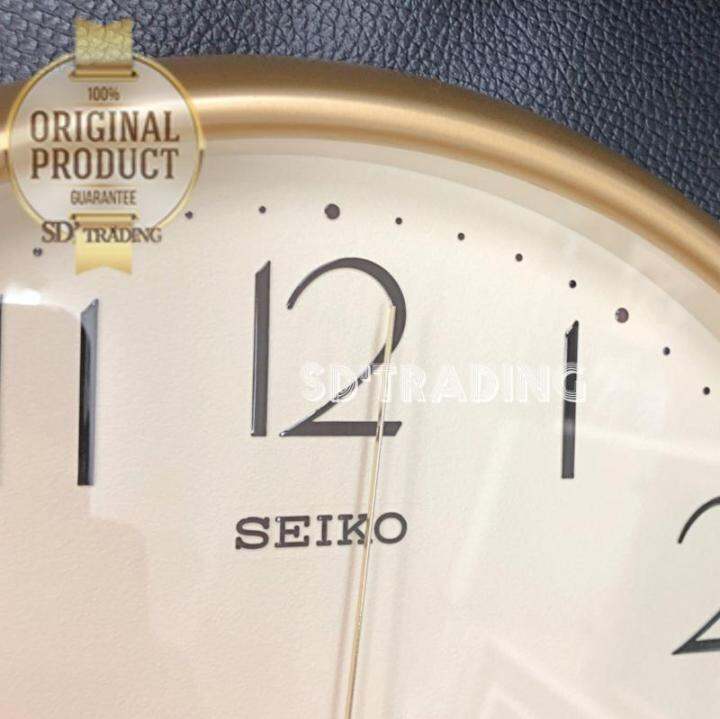 seiko-นาฬิกาแขวนผนัง-ขอบสีทองพ่นทรายหน้าครีม-รุ่น-qxa747g