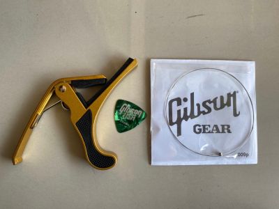 คาโป้ CAPO อย่างดี สีเหลือง มาพร้อมกับ สายแยกGibsonกีต้าร์ไฟฟ้า เบอร์ 009 1เส้น + ปิก1ชิ้น