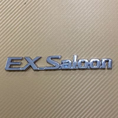 โลโก้* EX Saloon ติดรถ NISSAN สีชุบโครเมี่ยม ขนาด* 18 x 2.5 cm ราคาต่อชิ้น