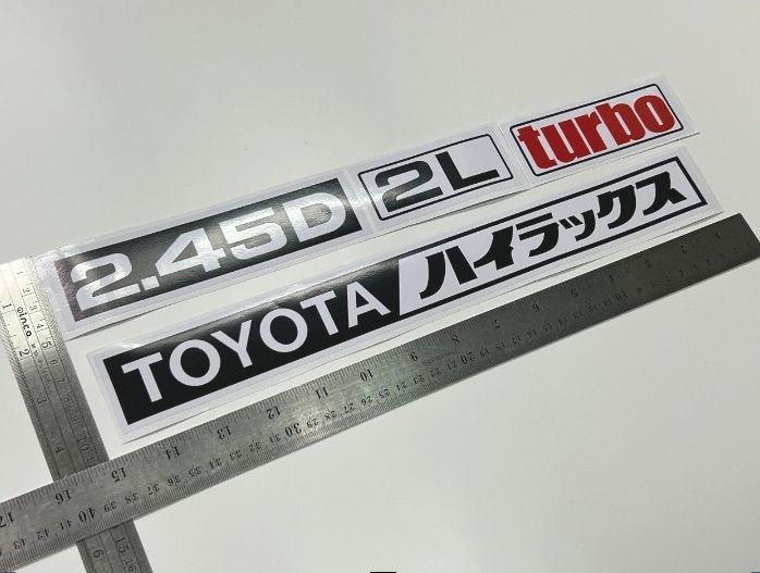 สติ๊กเกอร์ดั้งเดิม-ติดฝาท้าย-toyota-mightyx-mighty-x-โตโยต้า-ไมตี้-เอ็กซ์-คำว่า-toyota-2-8d-3l-turbo-2-45d-2l-turbo-sticker-ติดรถ-แต่งรถ-ภาษาญี่ปุ่น