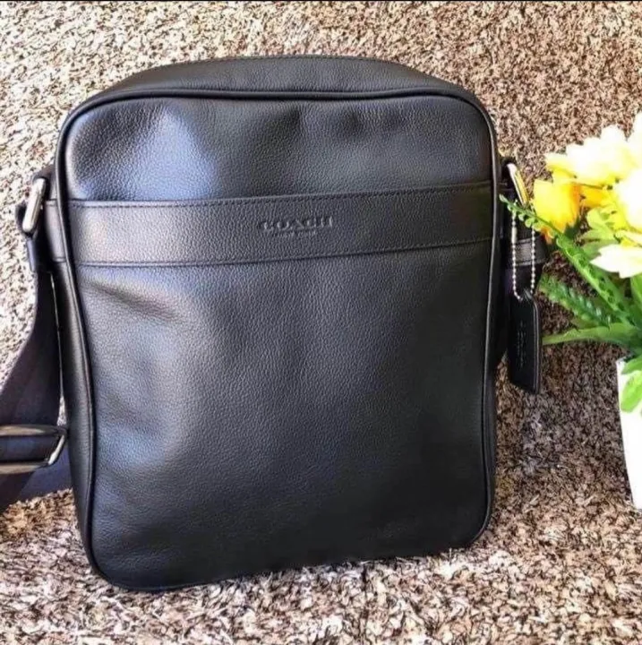 coach black leather sling bag