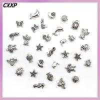 CXXP 96pcs โลหะผสมอัลลอยด์ ลูกปัดคั่นรูปสัตว์ทะเล ปลาดาวปลาดาว เงินสีเงิน จี้ลูกปัดสัตว์ การทำเครื่องประดับ หอยหอยปลา ลูกปัดหลวมหลากหลายธีมมหาสมุทร สำหรับสร้อยคอ