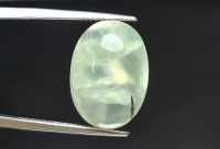 พลอยหลังเบี้ย ไหมเขียว (Green Rutilated Quartz)  น้ำหนัก 13.87 ct. ขนาด 13*6.6*17.8 mm. พลอยแท้ 100% เนื้อดี ราคาถูก