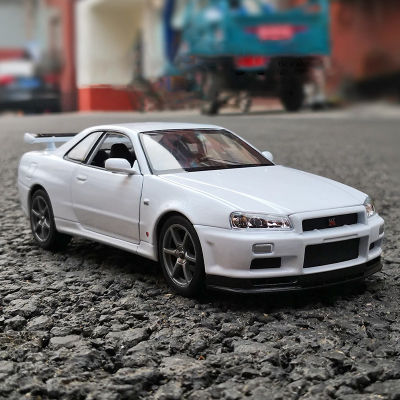 WELLY 1:24นิสสัน Skyline Ares GTR R34ล้อแม็กรถยนต์ D Iecasts และของเล่นยานพาหนะรถรุ่นขนาดจิ๋วรุ่นรถของเล่นสำหรับเด็ก