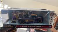 JADA 124รถยนต์ BATGIRL 1957 CHEVY CORVETTE กับตุ๊กตาจำลองโลหะโมเดลของเล่นยานพาหนะ