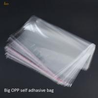 100pcslot Clear Resealable BOPPCellophane big 21x32cm(28+4) Transparent OPP gift bags Plastic packaging bag Self Adhesive Seal