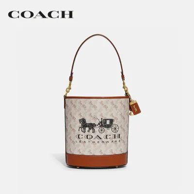 COACH กระเป๋าสะพายไหล่ผู้หญิงรุ่น Dakota Bucket Bag With Horse And Carriage Print สีครีม CH733 B4TXF