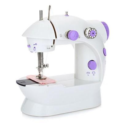 จักรเย็บผ้าขนาดเล็ก พกพาสะดวก รุ่น Mini Sewing Machine (สีม่วง) แถมฟรี อุปกรณ์เย็บผ้า รุ่นSM-202A