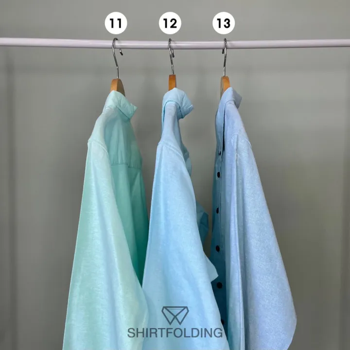 shirtfolding-เสื้อเชิ้ต-แขนยาวคอปก-สีเขียวมินท์-กระดุมดำ