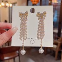 ? เครื่องประดับ S925 silver needle ultra light fairy long tassels pearl earrings female temperament luxury small bowknot diamond stud earrings earrings