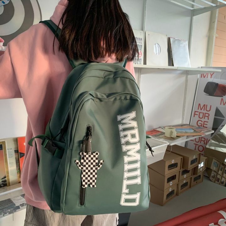 กระเป๋าเป้สะพายหลังผู้หญิงสไตล์ญี่ปุ่นความจุมาก2023ใหม่ส่งตัวอักษรกระเป๋านักเรียนมัธยมปลายเรียบง่าย