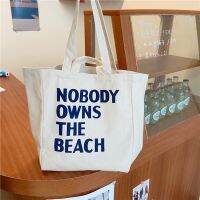 ifashionbagshop(IF1783) กระเป๋าผ้าใบใหญ่ NOBODY OWNS THE BEACH ผ้าแคนวาสมี4สาย