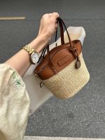 Uniqlo New Fashion version Straw bucket bag for women 2023 new summer versatile high-end texture niche fashion woven hand-held crossbody bag