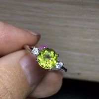 The natural olivine ring is exclusive to women. 925 silver and any clothes are beautiful.