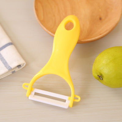 มัลติฟังก์ชั่นการออกแบบที่เรียบง่ายผู้ช่วยห้องครัวสีลูกอมอุปกรณ์ทำครัวเครื่องปอกเซรามิคที่สร้างสรรค์