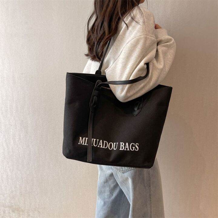 mlb-official-ny-large-capacity-bag-womens-new-hot-style-commuter-portable-canvas-bag-versatile-design-sense-niche-tote-bag