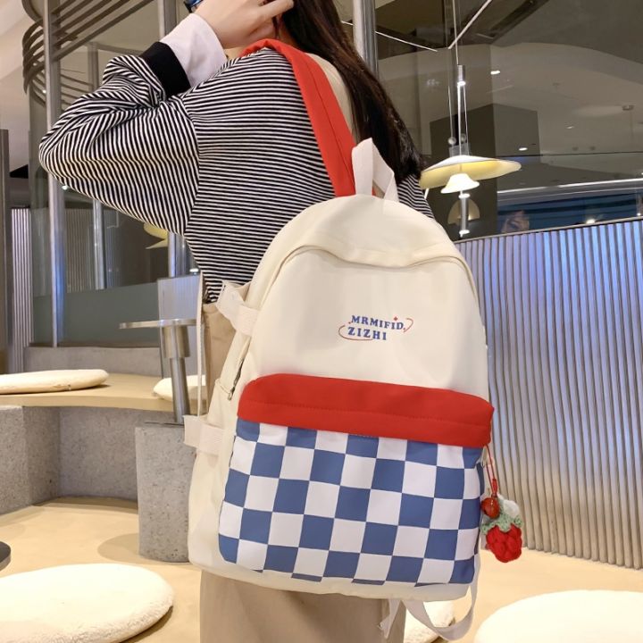 กระเป๋านักเรียนสาวน่ารักแฟชั่นความจุมากสำหรับผู้หญิงกระเป๋าบรรจุสีแบบชนสไตล์เกาหลีใหม่