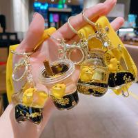 Internet celebrity up to duck key chain into the oil floating cartoon doll key chain quicksand bottle pendant exquisite gift wholesale key toys