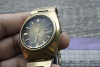 นาฬิกา Vintage มือสองญี่ปุ่น SEIKO 6309 7009 ระบบ AUTOMATIC ผู้ชาย ทรงกลม กรอบทอง หน้าปัดสีเขียว หน้าปัด 37มม. ตัวเรือนสแตนเลสใช้งานได้ปกติ สภาพดี ของแท้ ไม่กันน้ำ