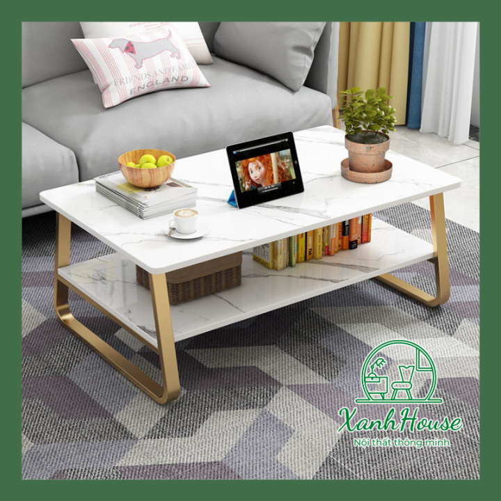 Bàn trà sofa phòng khách thông minh đa năng với 2 tầng là lựa chọn thông minh cho căn phòng của bạn. Bên cạnh việc làm bàn trà, bạn cũng có thể sử dụng nó để đặt đồ dùng cá nhân và sách báo. Với thiết kế tối giản và chất lượng đảm bảo, bàn trà thông minh sẽ giúp bạn tiết kiệm không gian và thời gian.
