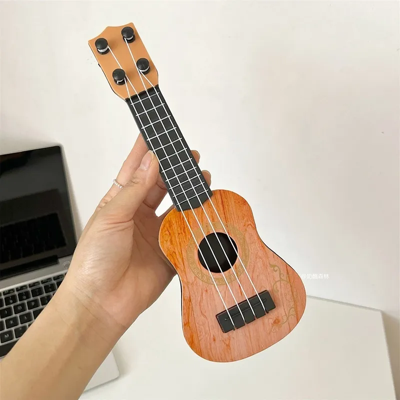 Đồ Chơi Đàn Ukulele Mini Để Bàn Trang Trí 〖QYUE〗 | Lazada.vn