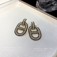 [COD] needle European and diamond-encrusted pig nose letter earrings high-end sense super ins temperament light luxury wholesale