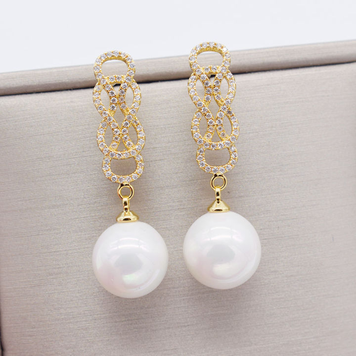 white-teardrop-sea-shell-pearl-white-golden-plated-cz-pave-earrings