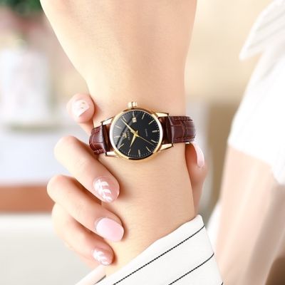 OLEVS นาฬิกาข้อมือผู้หญิงกันน้ำวันที่ธุรกิจหนังสีน้ำตาลนาฬิกาควอตซ์ผู้หญิงนาฬิกาแฟชั่นส่องสว่าง