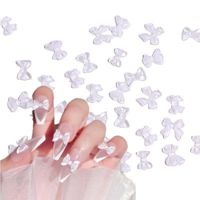 100pcs/Bag Fairy Ribbon Bowknot Nail Art Decorations 3D Ice Transparent Bow Nail Ornament Resin Bow Manicure Nail Accessories