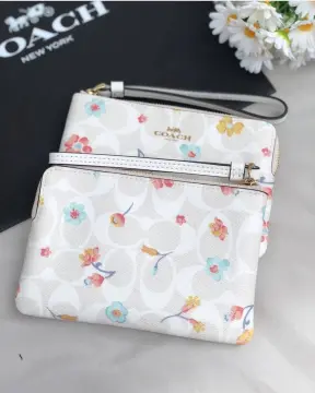 Coach Outlet Small Wristlet With Floral Print - ShopStyle Wallets & Card  Holders