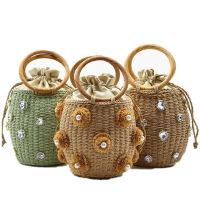 The new portable straw bag pearl flower handmade bag rhinestone crystal embellished straw handbags straw bucket bags bags