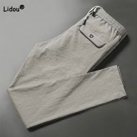 Male Clothes Fashion Solid Color Pockets Casual Pants 2023 Summer Casual Comfortable Elastic Waist Drawstring Trousers For Men