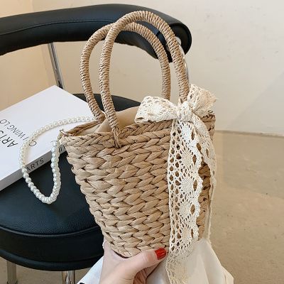 This year popular bag handbag 2022 new fashion ins straw hand-held bucket bag worn straw bag