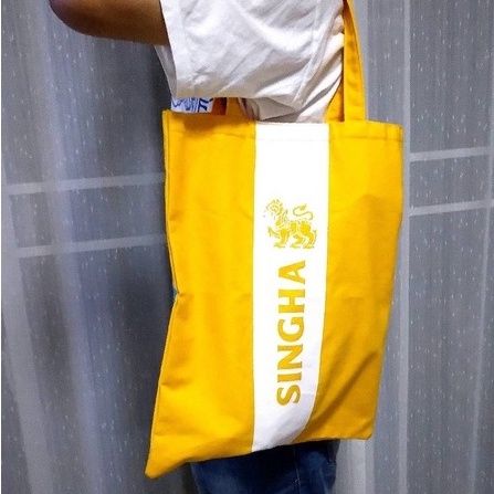 กระเป๋าเคียงสิงห์-ขนาด-a4-ทำจากผ้าแคนวาสสีเหลืองสด
