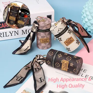 Does anyone have a good seller for Louis Vuitton these little keychain  wallets or coin purses? : r/DHgate