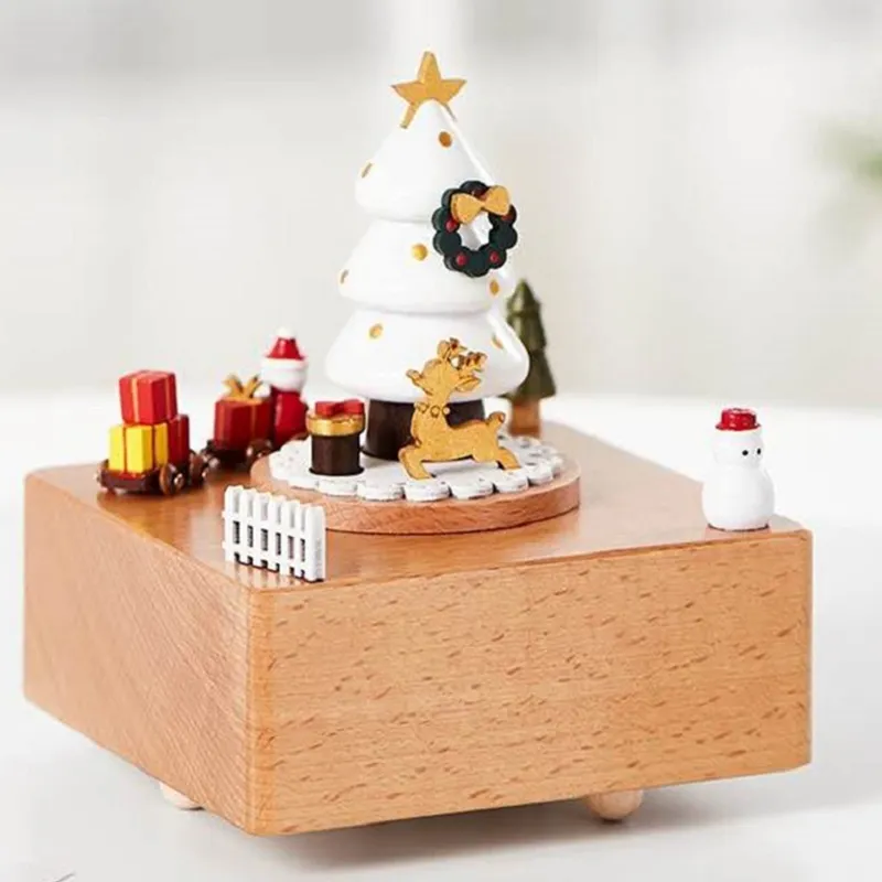 Những chiếc nhạc hộp giáng sinh gỗ với hình Santa Claus, cây thông và tàu hỏa làm cho không gian gia đình của bạn trở nên lung linh và vô cùng ấm áp. Những giai điệu nhẹ nhàng, tuyệt vời của chúng sẽ mang lại niềm vui và hạnh phúc cho bạn và người thân trong dịp lễ quan trọng này. Click vào hình ảnh để khám phá những chiếc nhạc hộp độc đáo này.