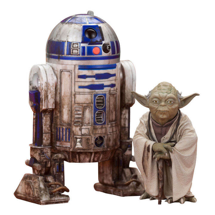 Figurine R2d2 Is Standing On A Desk Backgrounds | PSD Free Download