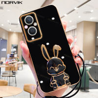 NORVIK เคสมือถือชุบโลหะสีดำสุดหรูพร้อมเชือกผูกกระต่ายนำโชค,สายคล้องสำหรับ OPPO Reno 10 8T A98 A78 A58 A17 A17K 8 8Z 7 7Z A57 A77S A77ค้นหา X5 A96 A76 A16 6 6Z A74 A95 2F 2Z n1-2ฝาครอบปลอกอ่อน Pro Plus 4G 5G