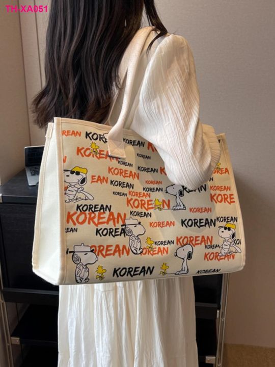 กระเป๋าผ้าแคนวาสลายตัวอักษรหญิง-2023-ใหม่แฟชั่นออกนอกบ้านกระเป๋าช้อปปิ้งแบบพกพากระเป๋าสะพายไหล่แม่ความจุขนาดใหญ่